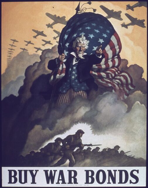 Poster of Uncle Sam standing with the American flag and the text, 
