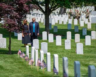 President Donald Trump and First Lady Melania Trump visit gravesites in Section 34 of Arlington National Cemetery, Arlington, Virginia, May 23, 2019. The year before, Trump reportedly declined to visit a different military cemetery, saying it was “filled with losers.” 
