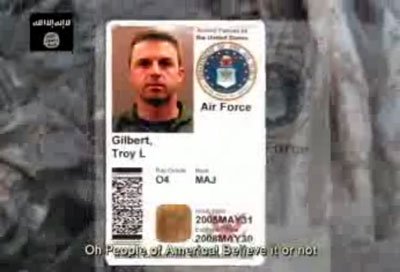 Al Qaeda insurgents took the body of Air Force Maj. Troy Gilbert from the wreckage of his F-16 before U.S. forces could arrive. This screengrab is from a propaganda video that included footage from the crash site. Photo courtesy of the author.