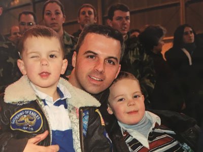 Air Force Maj. Troy Gilbert with his sons. Gilbert was killed in Iraq in November 2006 while protecting U.S. troops. Photo courtesy of the author.