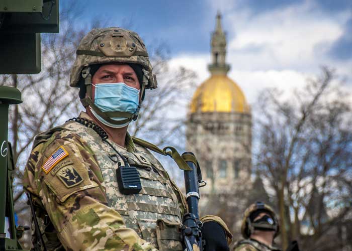 A soldier assigned to the Connecticut National Guard stands guard in Hartford, Connecticut, Jan. 17, 2021. 
