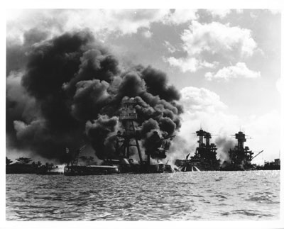 Burning and damaged ships at Pearl Harbor, Dec. 7, 1941. Photo courtesy of the U.S. National Archives and Records Administration.