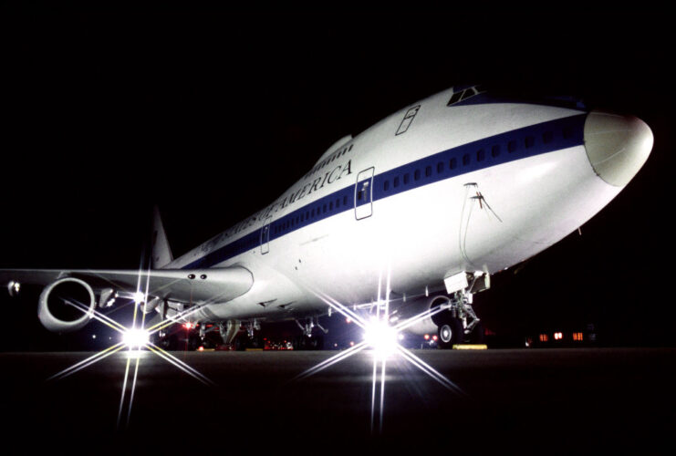 Doomsday plane parked on the runway at night