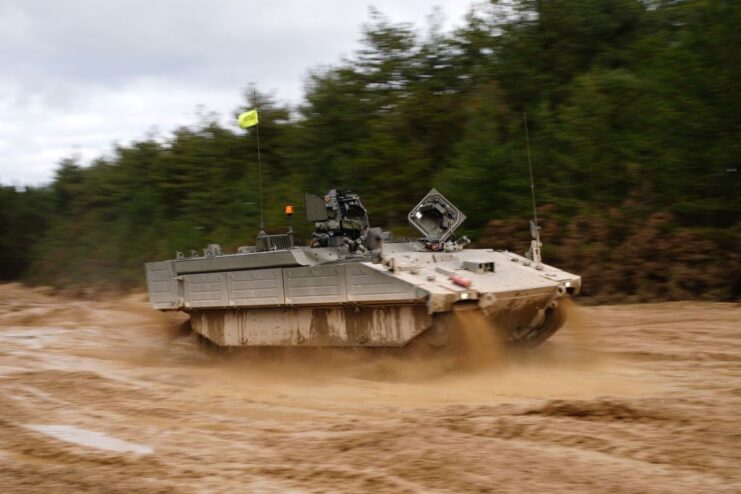 Ares armored fighting vehicle (AFV) driving along a dirt course