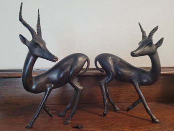 These two hand-carved gazelles from Africa have held on through half a dozen moves—with the help of superglue. Photo courtesy of the author.