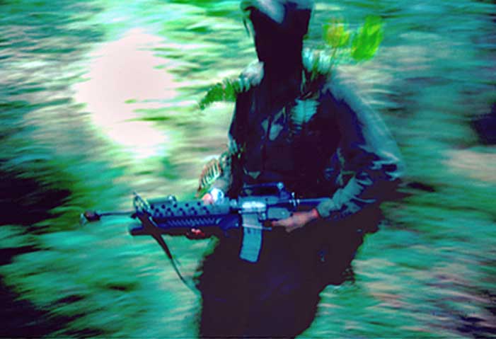 A 1st Cavalry trooper on recon patrol deep in the jungle of the Central Highlands. 