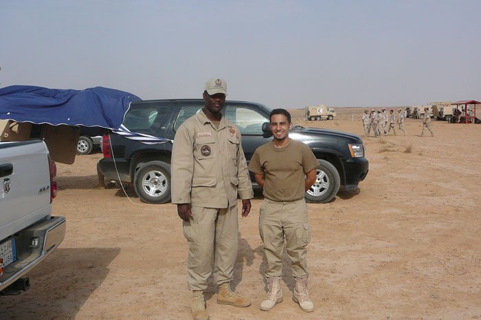 Ernest Barrington (left), pictured with interpreter, Abdulah Al Harbi, during their time as contract workers in Saudi Arabia, training with the Saudi Arabian National Guard in 2009.