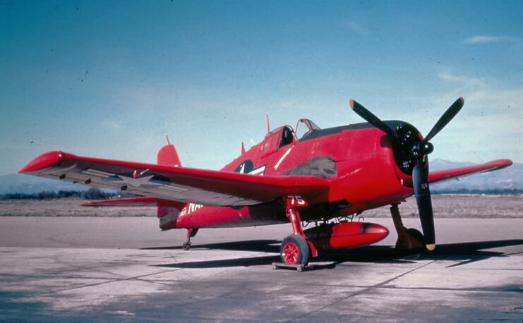 Grumman F6F-5K parked on a runway